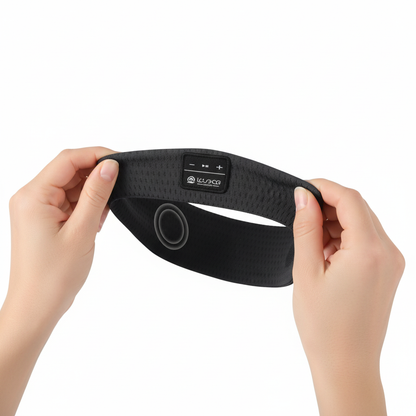 Hands adjusting headband